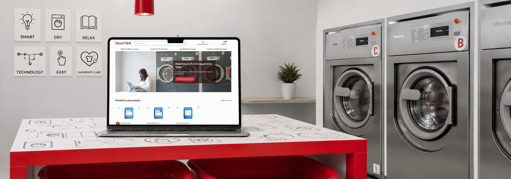 Nuovo e-commerce Bloomest visualizzato su un laptop all'interno di una lavanderia self-service moderna.